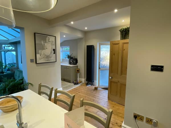 Finished open-plan kitchen-diner created by opening up the ground floor