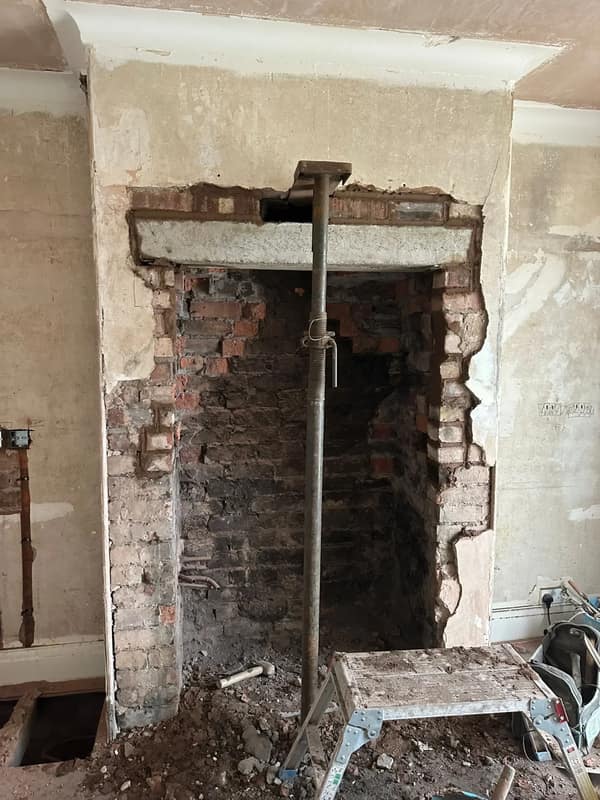 Chimney breast opened up with a new lintel during internal alterations